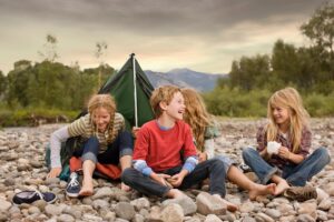 Group of Happy Kids Camping
